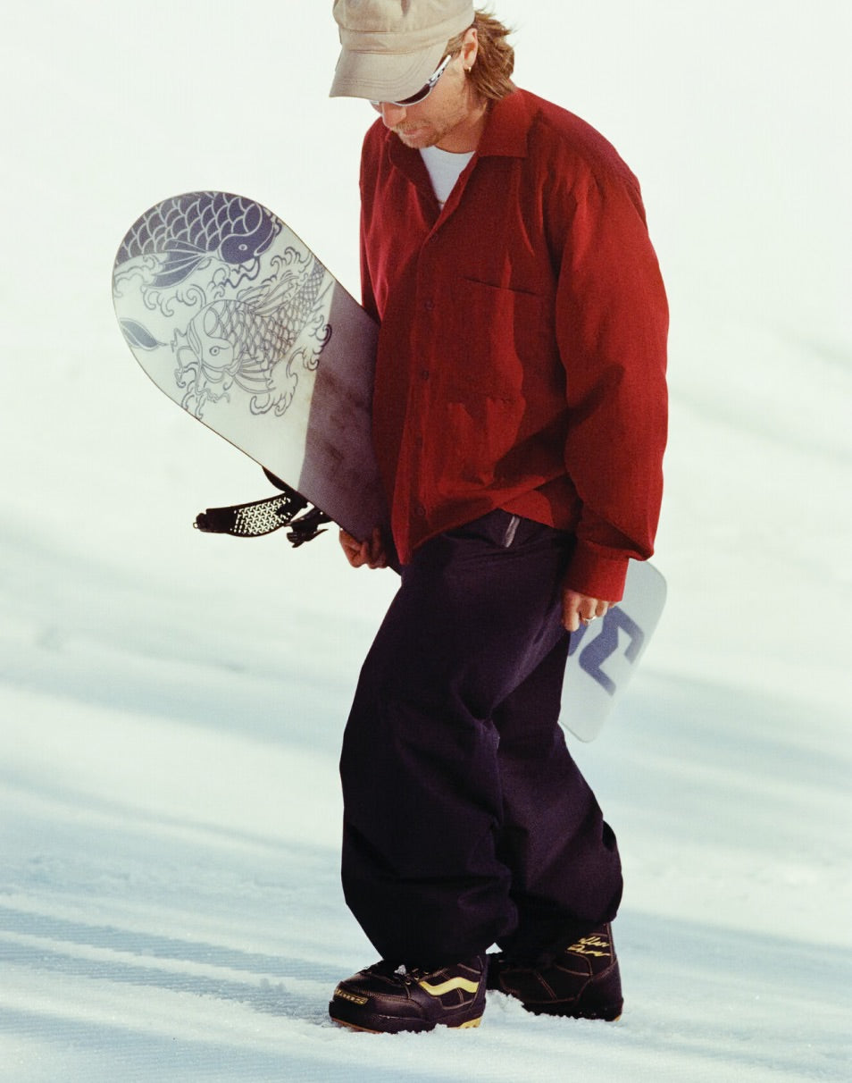 Rene Rinnekangas saappaiden kanssa