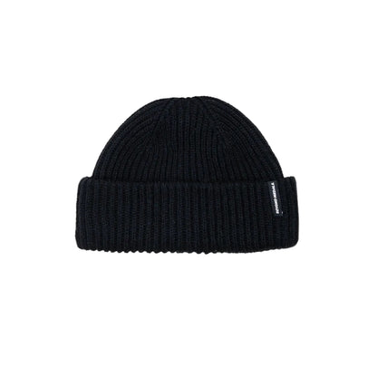 Black beanie with a brand logo on a light gray background