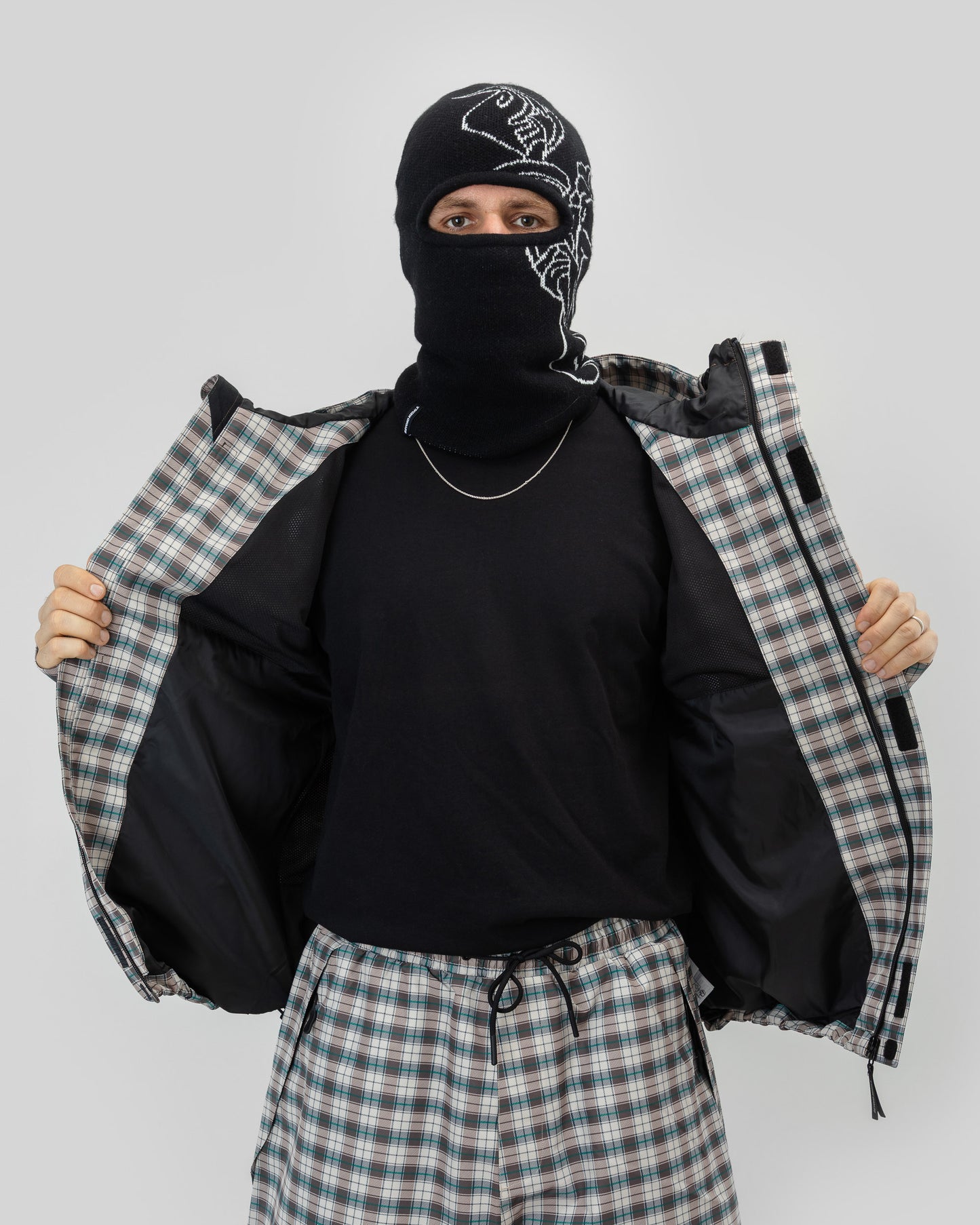 Mitalien tuolla puolen - Ruututakki