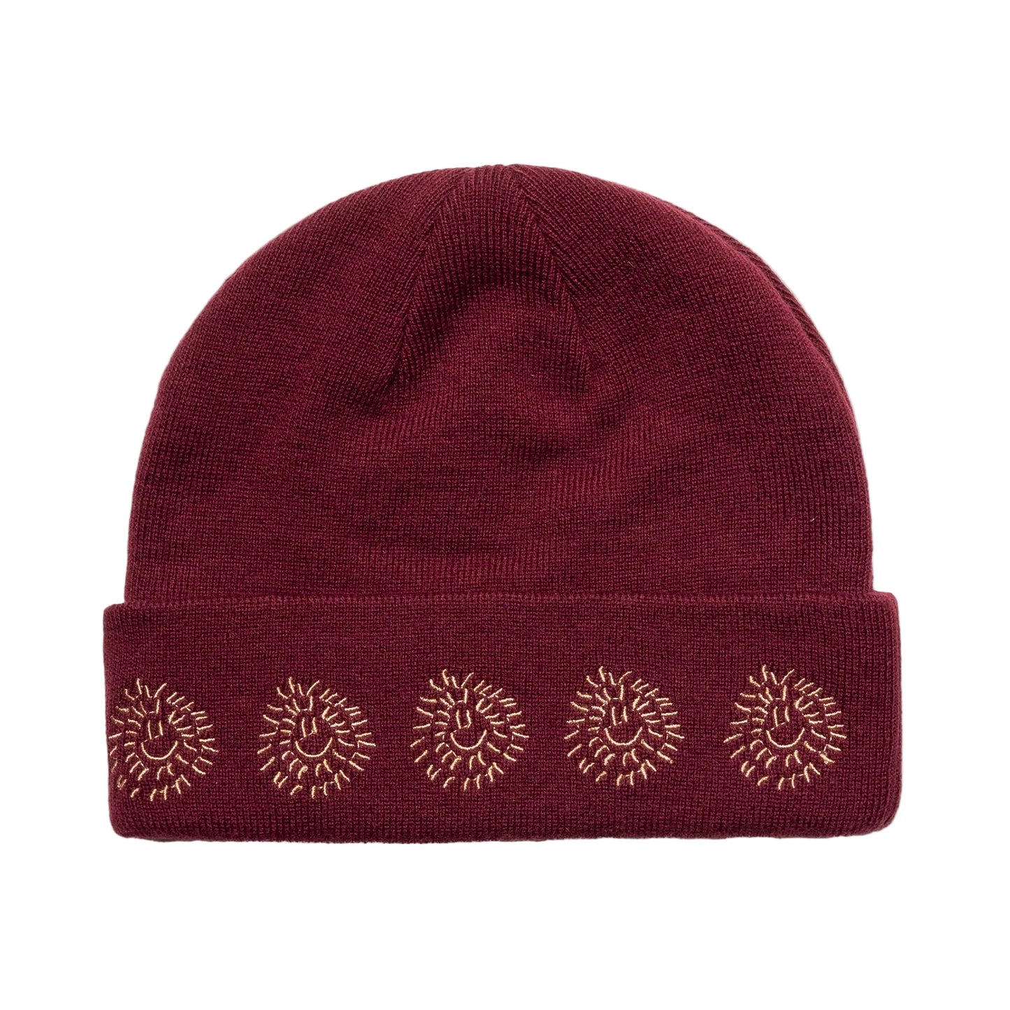 Maroon beanie with sunburst patterns on a white background