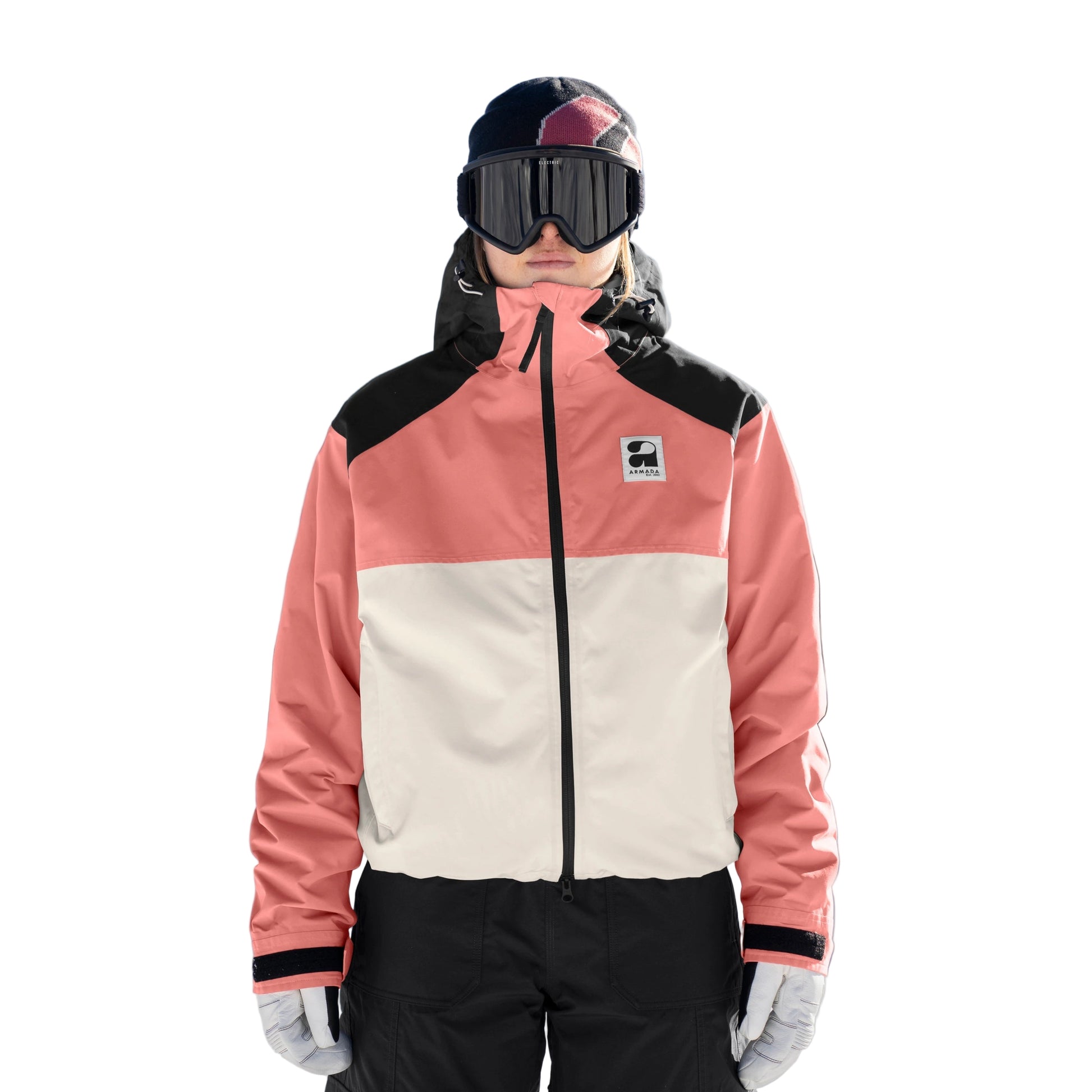 Person wearing a pink and beige jacket with black accents on a snowy background